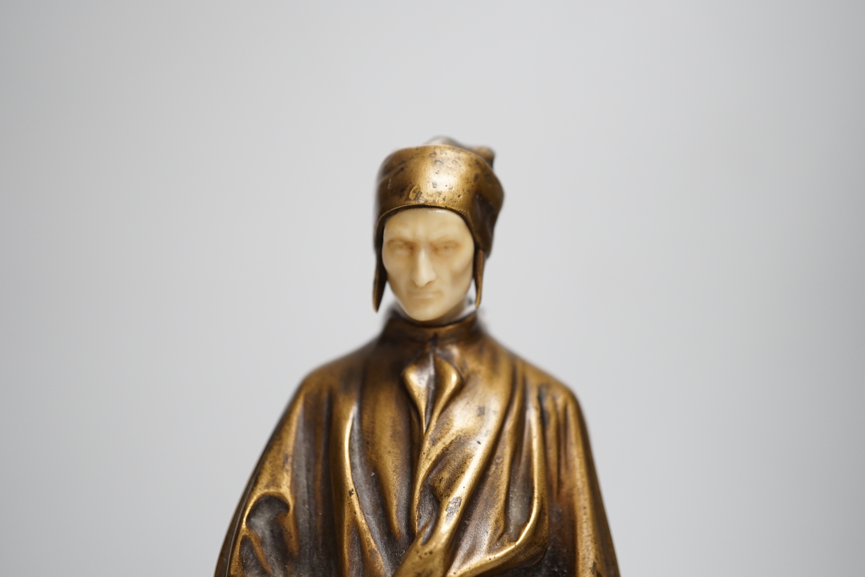 A. Faguelle. A bronze and ivory figure of Dante, c.1900, foundry Susse Frere Ed. Paris, 21cm high. Ivory submission reference W6JZW8QL